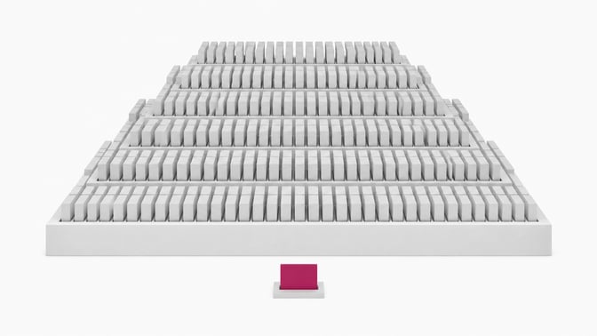 A single accented hardware token sits in front of a sharply stepped structure holding hundreds of identical blank tokens in a dense grid, illustrating the escalating volume of per-seat SaaS billing.