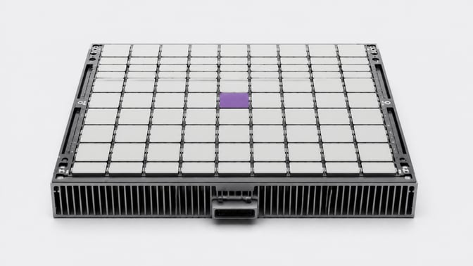 A massive, heavy artificial intelligence accelerator blade and cooling assembly featuring an orderly grid of processing dies.