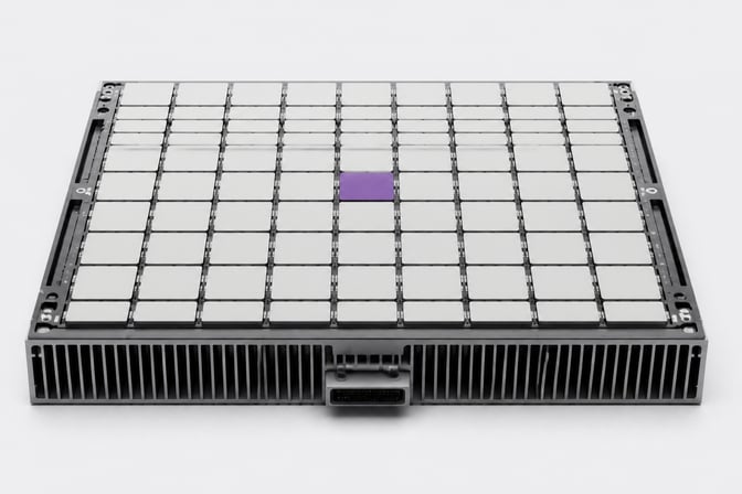 A massive, heavy artificial intelligence accelerator blade and cooling assembly featuring an orderly grid of processing dies.