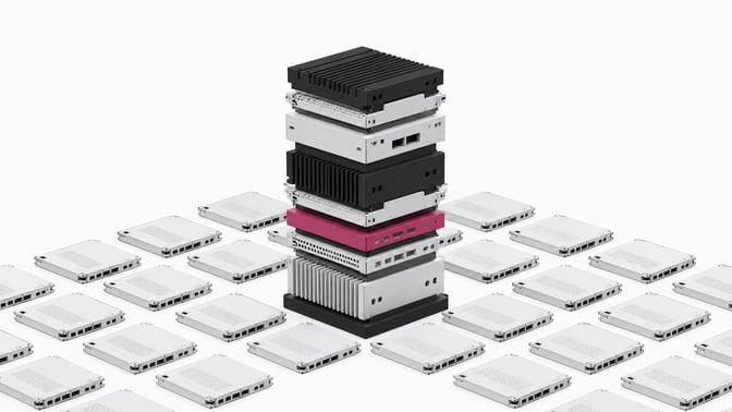 A towering stack of diverse, interlocking hardware modules rising from a grid of identical components to represent a custom-built infrastructure stack.