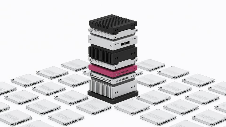 A towering stack of diverse, interlocking hardware modules rising from a grid of identical components to represent a custom-built infrastructure stack.